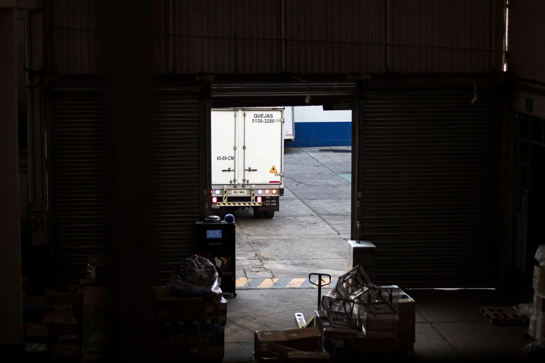 Delivery truck in an industrial setting